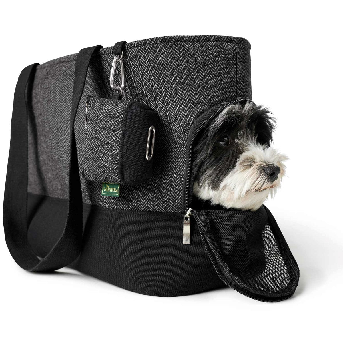 Aperturas de malla en la Bolsa Transportín Hunter, proporcionando ventilación y comodidad para tu perro durante los viajes.