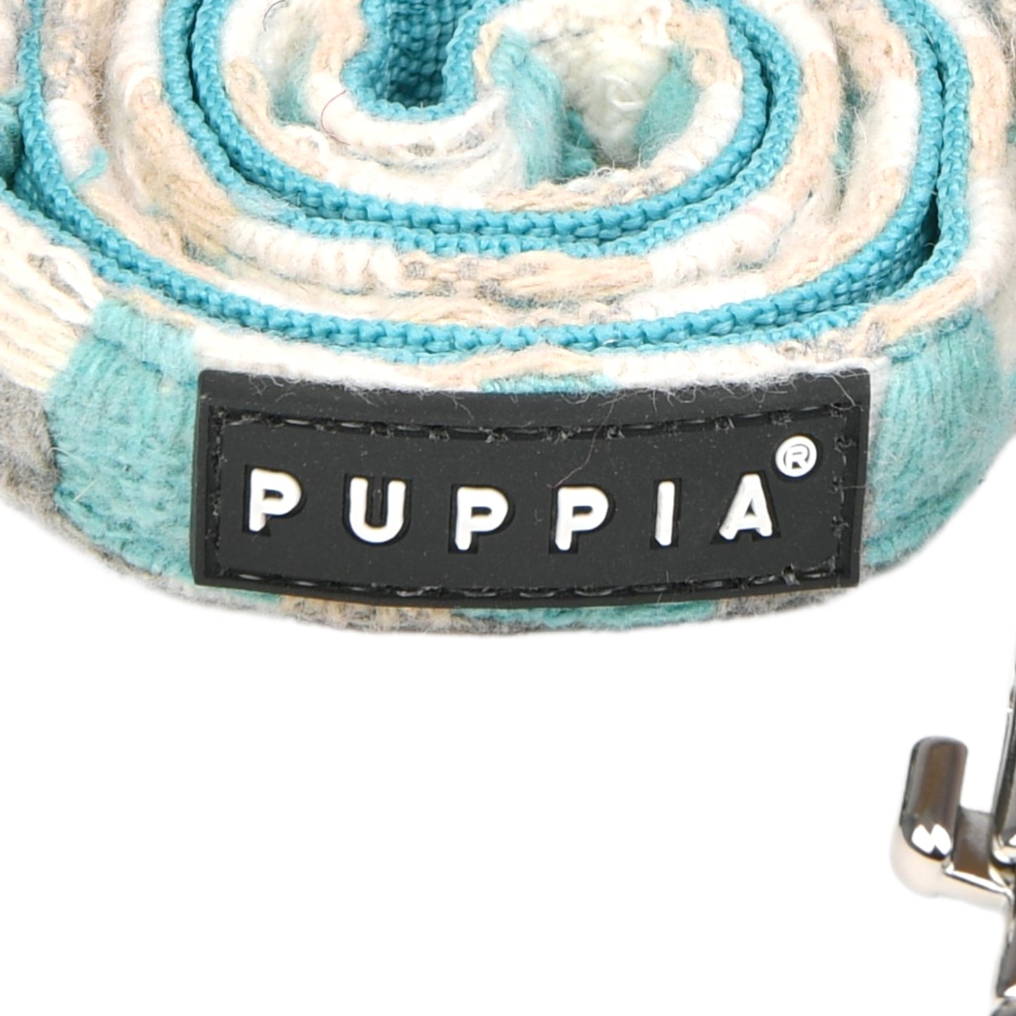 Primer plano del material resistente y costuras reforzadas de la correa Arden de Puppia.