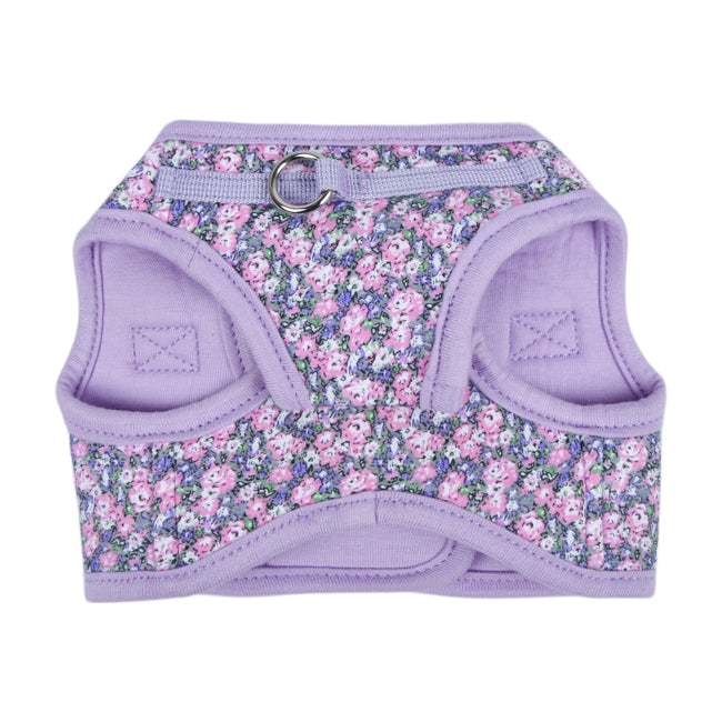 Primer plano del Arnés chaleco Kealoha de Puppia, mostrando su estampado floral en tonos suaves y el sistema de doble cierre de velcro y hebilla.