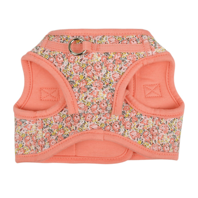 Primer plano del Arnés chaleco Kealoha de Puppia, mostrando su estampado floral en tonos suaves y el sistema de doble cierre de velcro y hebilla.