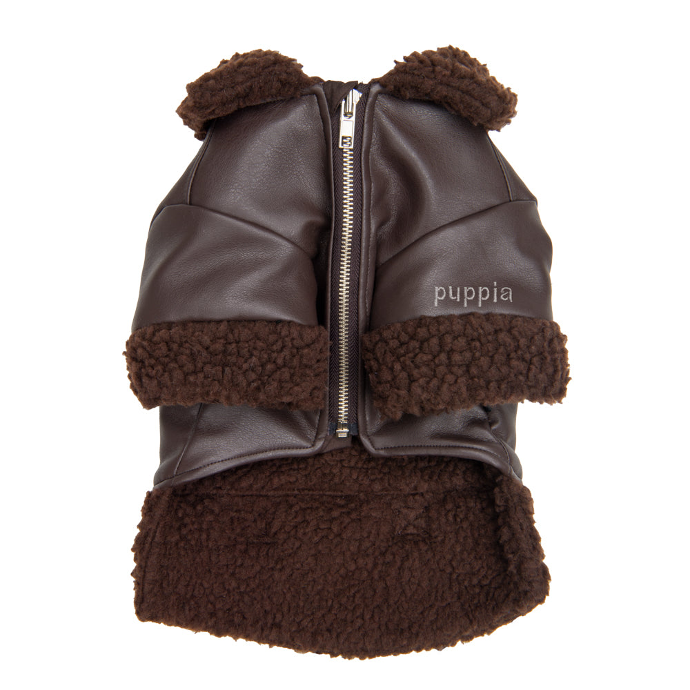 Primer plano del forro de sherpa en la Chaqueta Soft Leather Puppia, destacando la suavidad y calidez que proporciona a tu mascota.