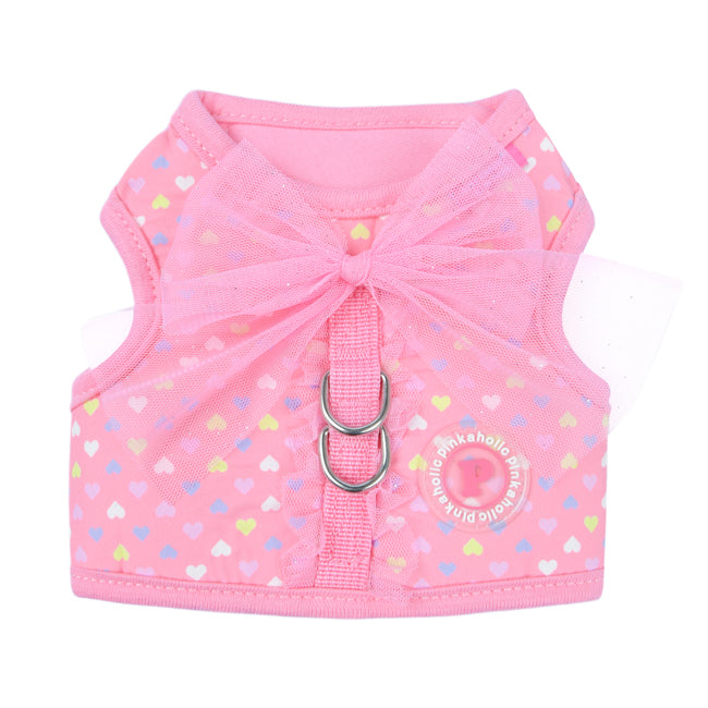 Arnés Mabel de Pinkaholic para perros pequeños, con estampado de corazoncitos en rosa y lazo decorativo en la parte superior.