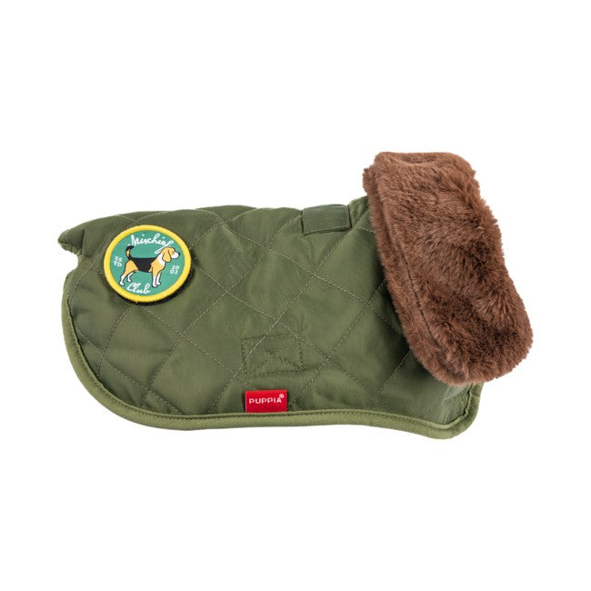 Tejido impermeable exterior de la chaqueta Highland de Puppia, protegiendo a perros de lluvia y nieve.