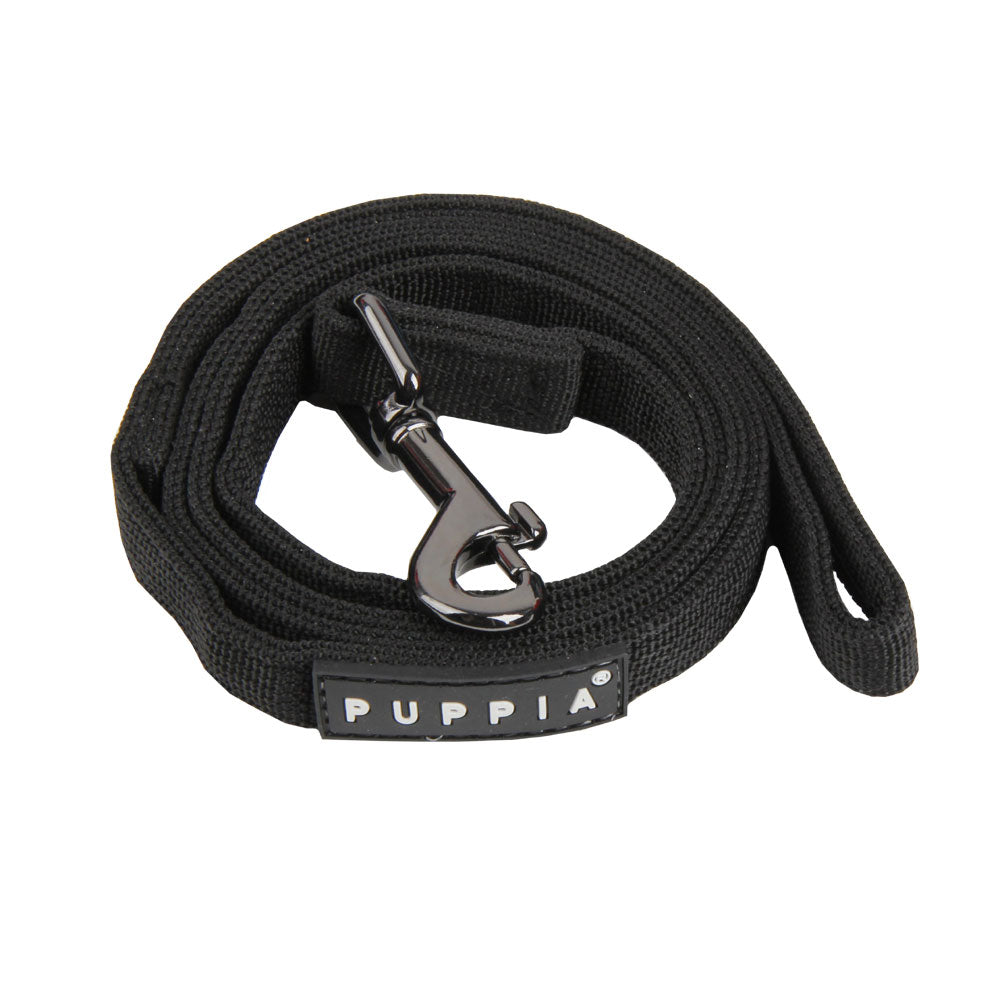 Correa Two Tone Puppia fabricada con poliéster de alta calidad, ofreciendo resistencia y durabilidad para el uso diario.