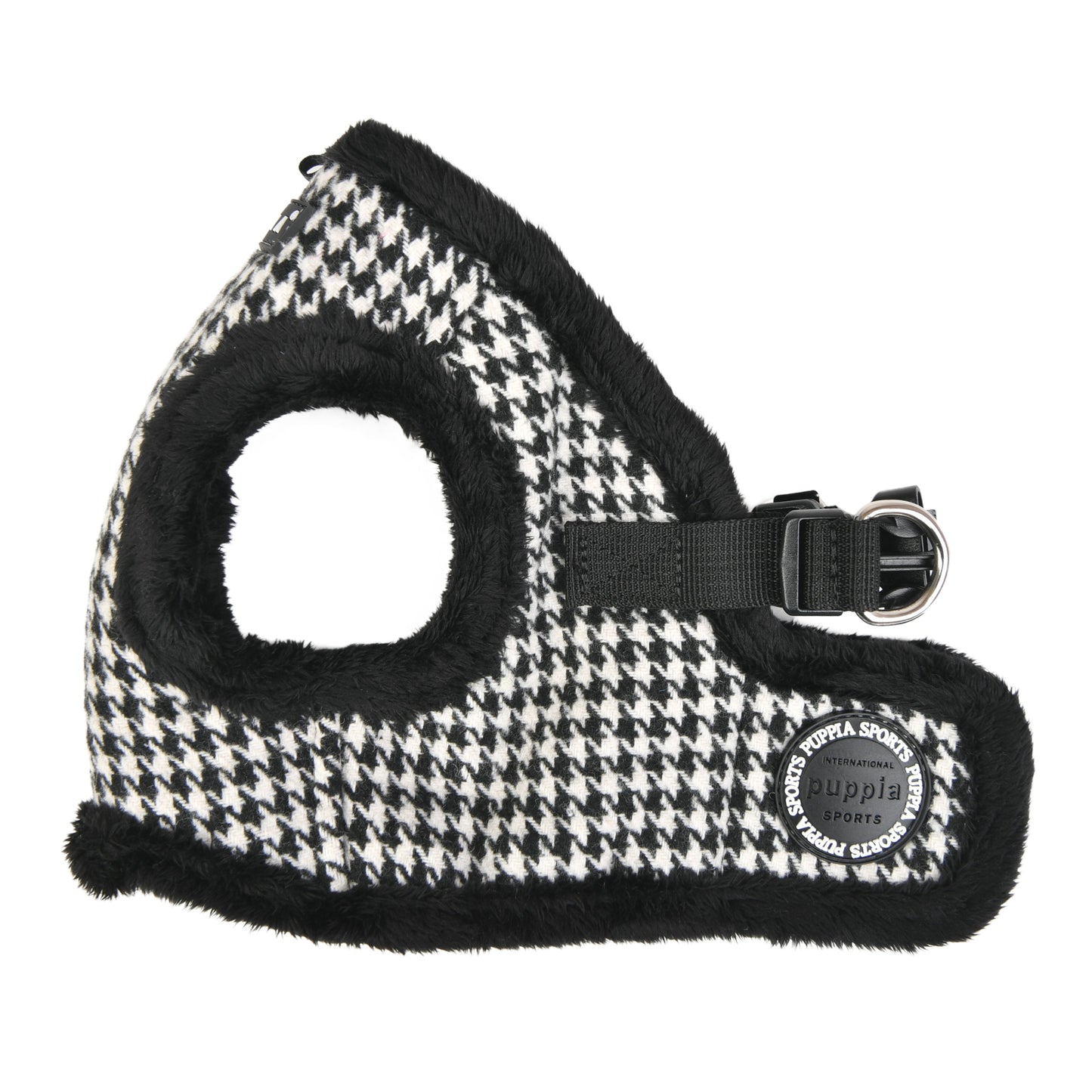Detalle del sistema de cierre seguro con velcro y hebilla del arnés chaleco Shepherd para perros.
